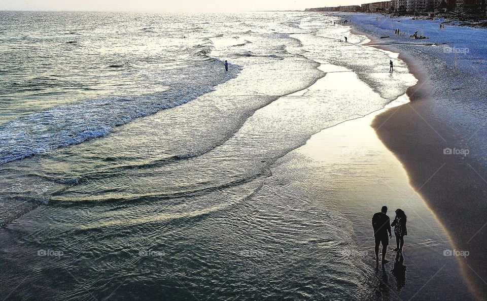 tourist couple at golden hour.