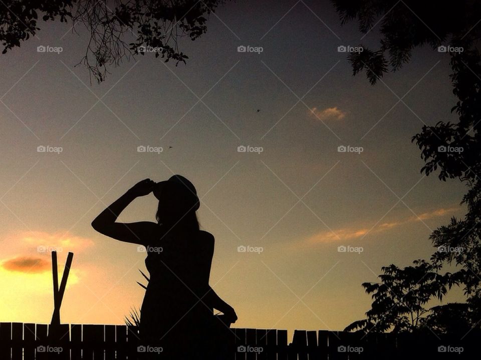 Look out . She doesn't know what to look for but she knows to look for something. 