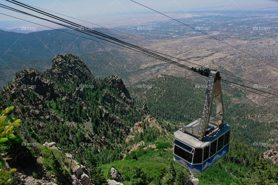 Sky car travel up mountain side