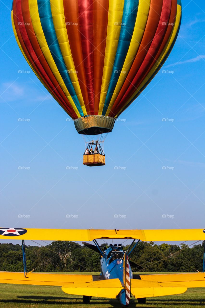 Hot air balloon and biplane