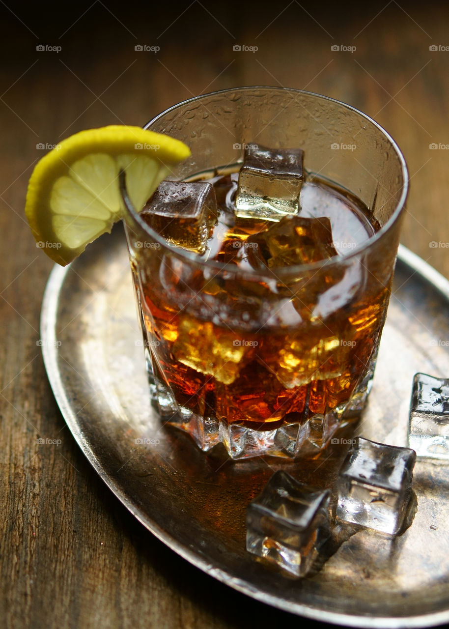 whiskey with ice in a glass