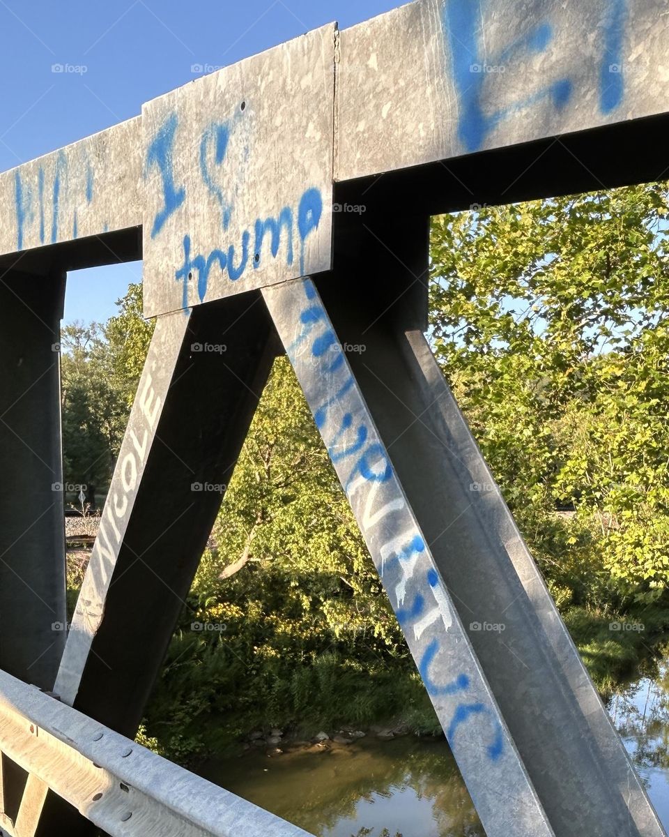 I love Trump graffiti on a bridge