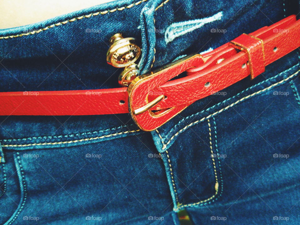 Denim. Denim jeans with red belt