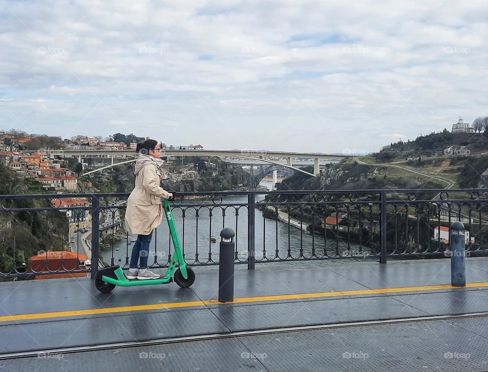 Girl riding a scooter