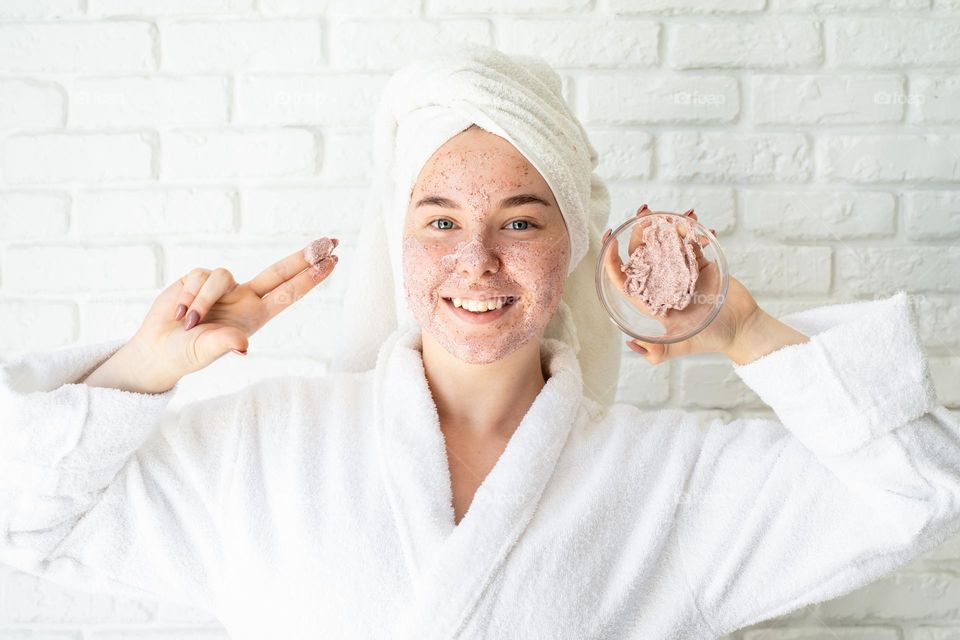 woman hand holding beauty products