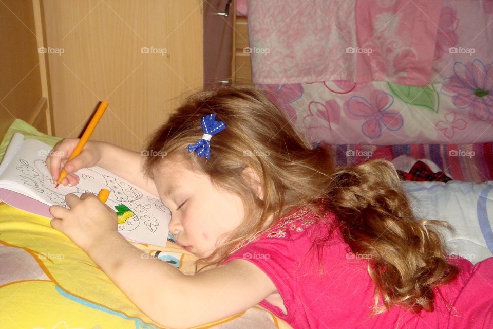 Child fell asleep coloring
