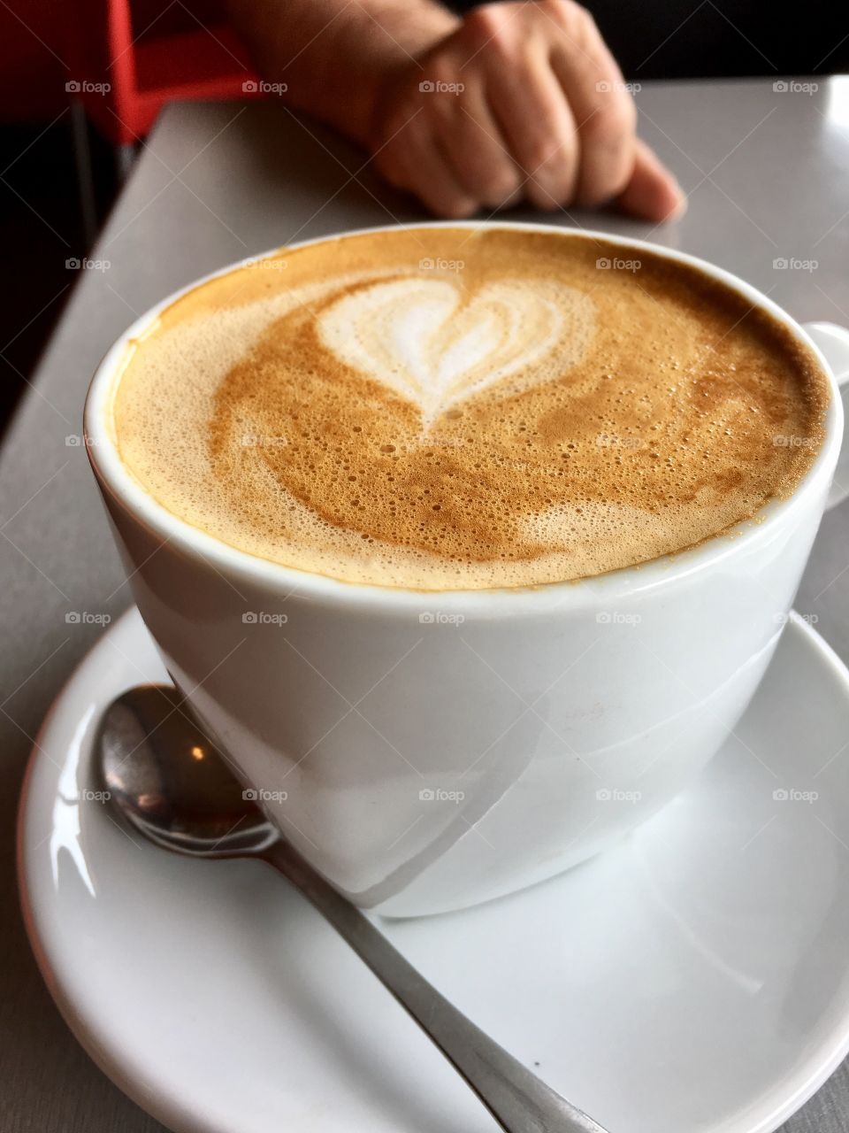 I love you, heart shape in the foam of a Cafe latte in coffee shop, 