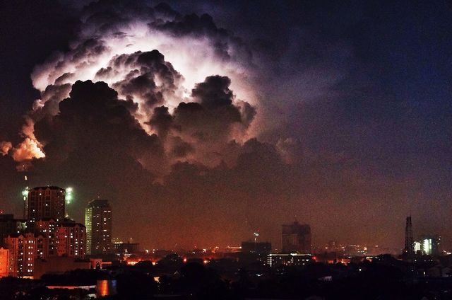 Lightning behind the clouds