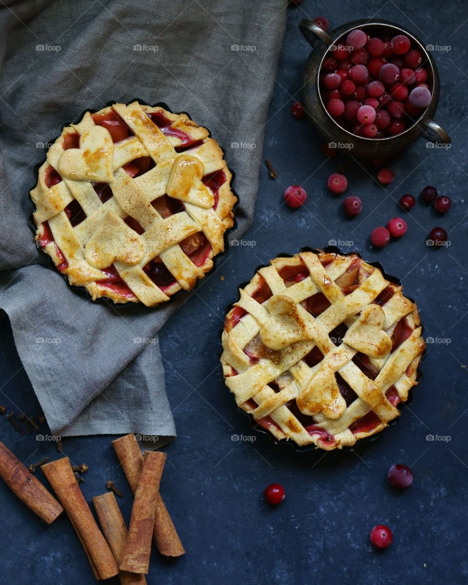 apple and cranberry pies cooking