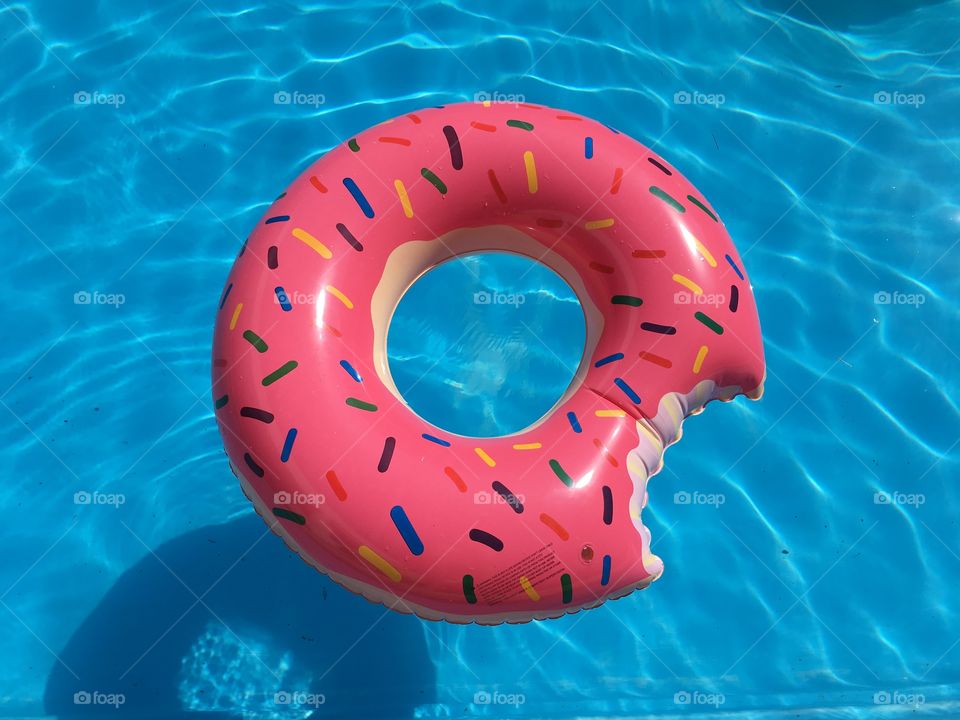 Donuts floater. Pink floater. Blue water. Poll party. 