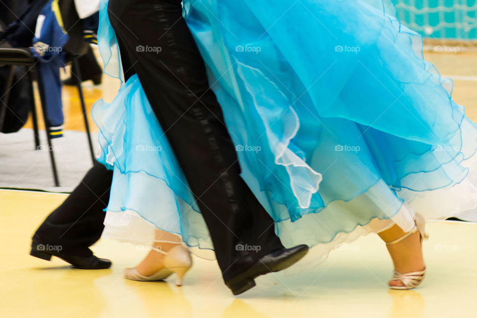 Boy and girl dancing in costumes