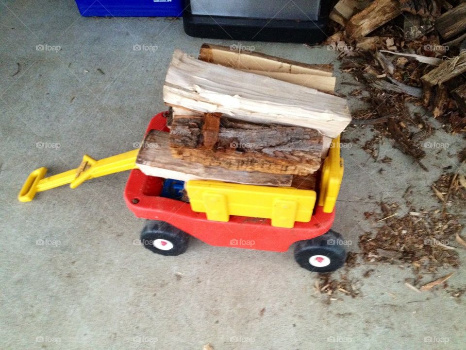 Little Tykes wagon, little red wagon, carting wood, 23 years old