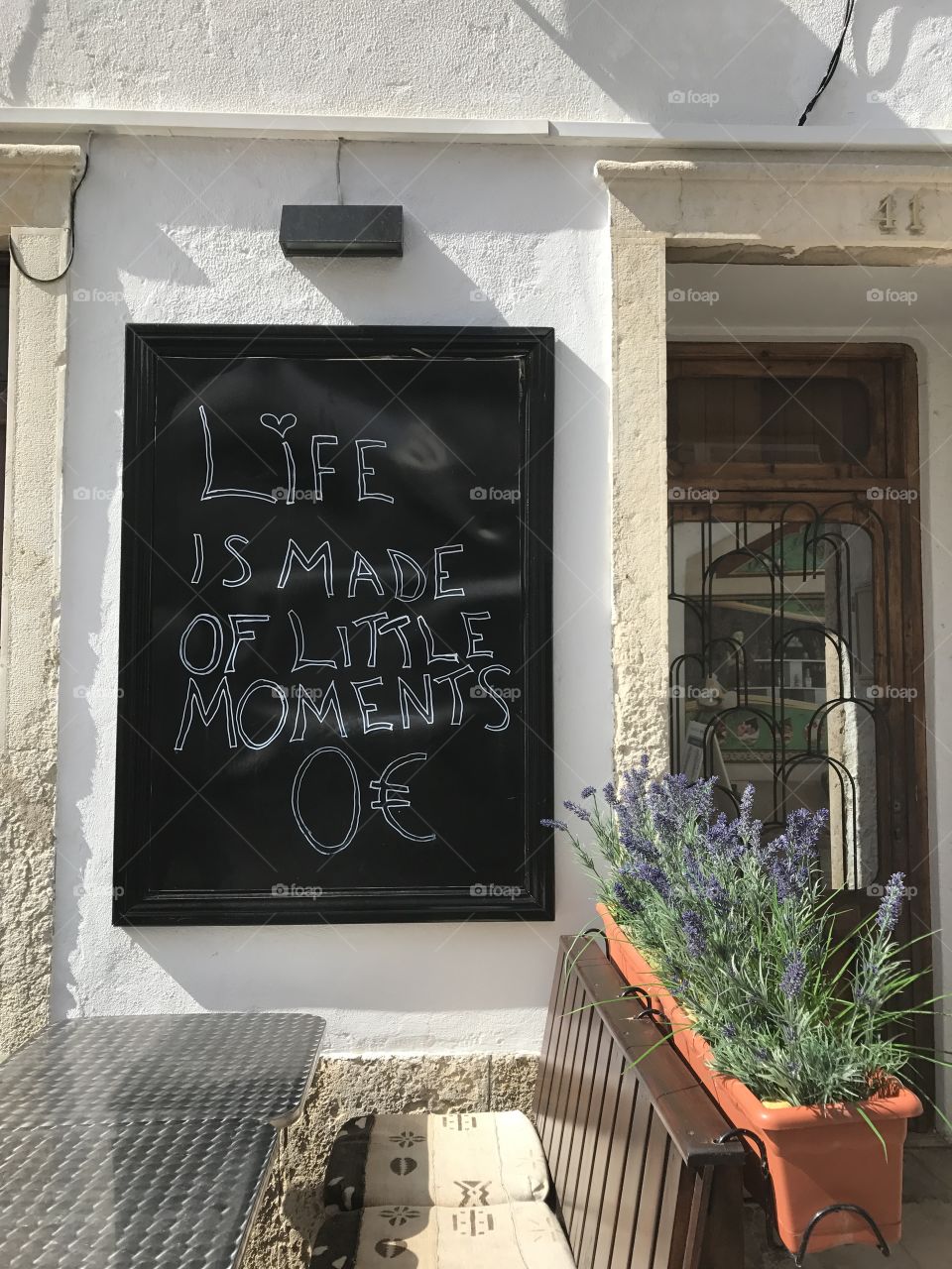 Words of wisdom along the streets of a quaint beach town in Portugal. Nice reminder that life is made up of experiences, not things. 