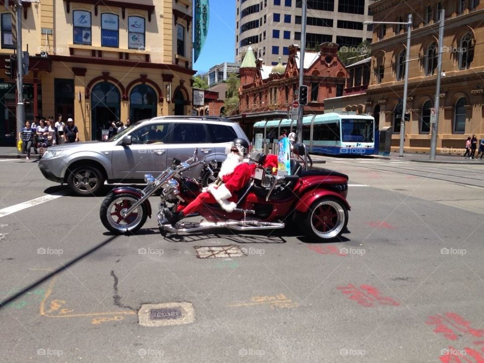 Santa riding a trike
