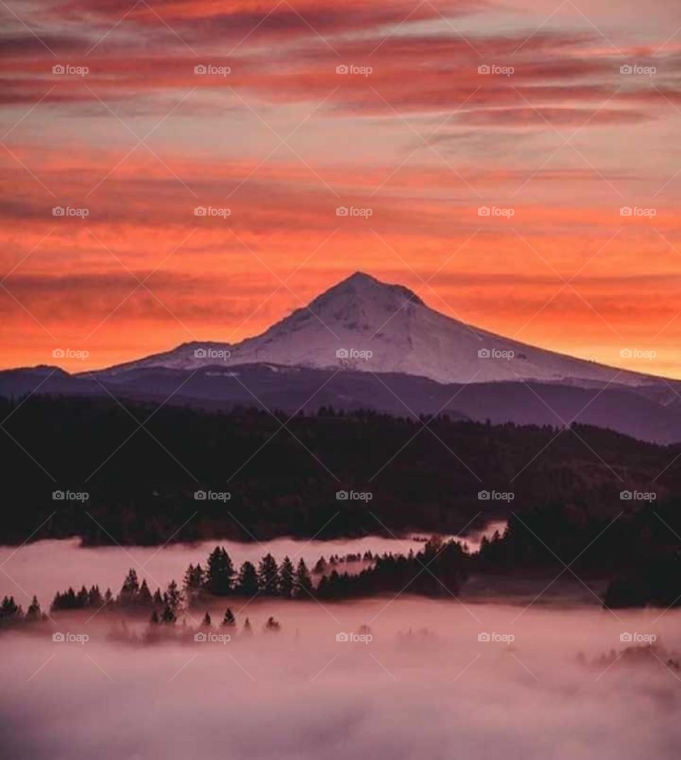 sunset were peak and clouds meet