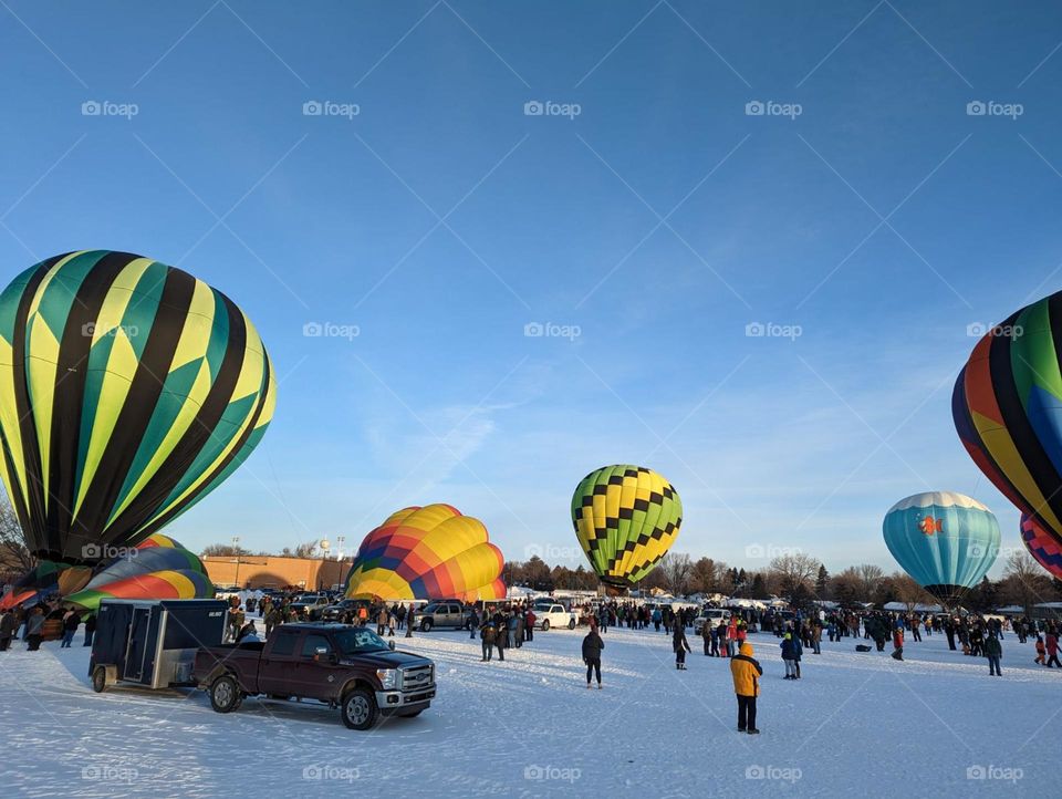 multiple hot air balloons getting ready to fly up into the sky balloon mission colorful balloons