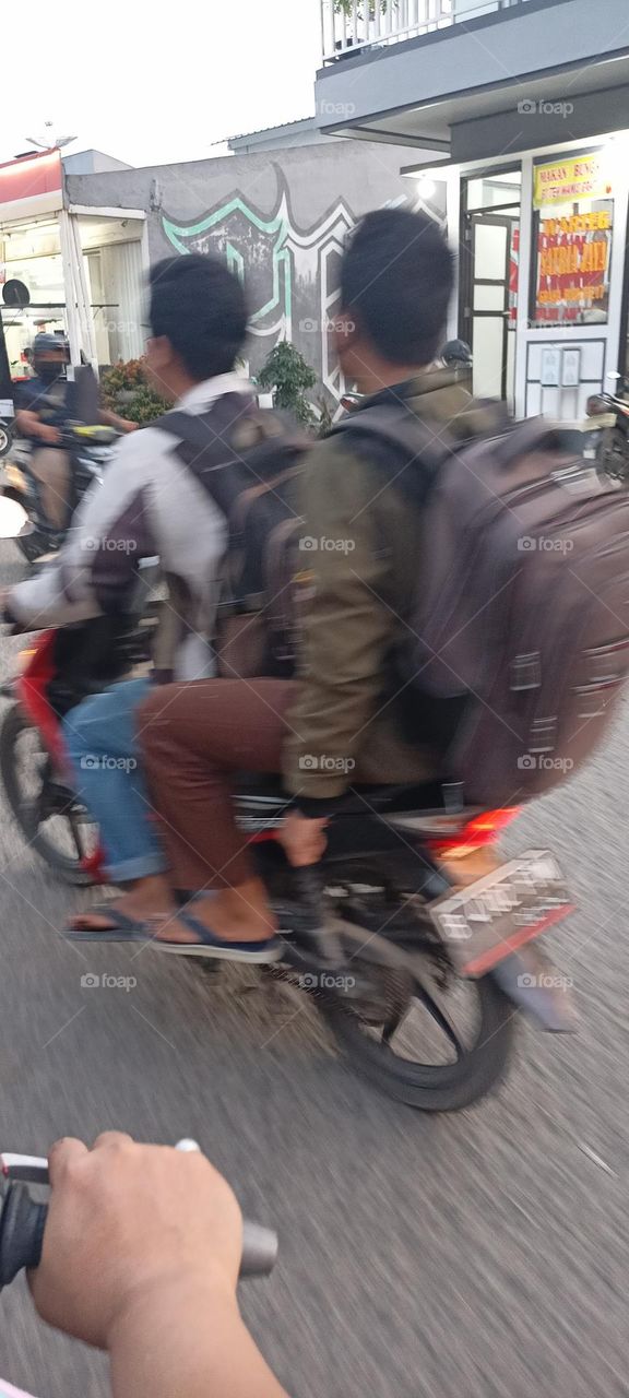 Riding The Motor With Friend