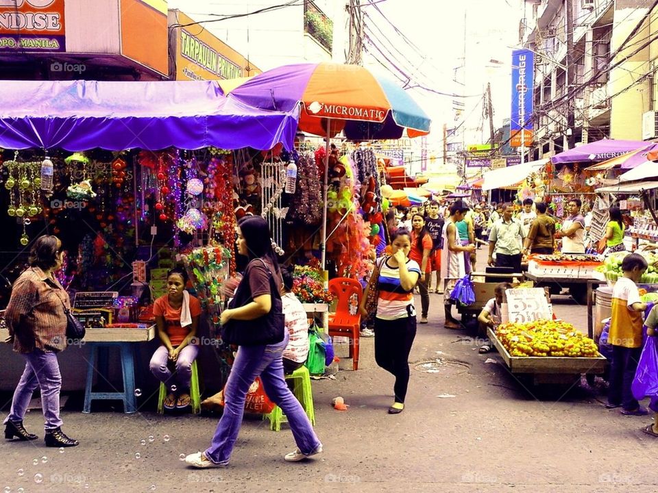 Street Vendors in Quiapo Manila philippines sell christmas decor