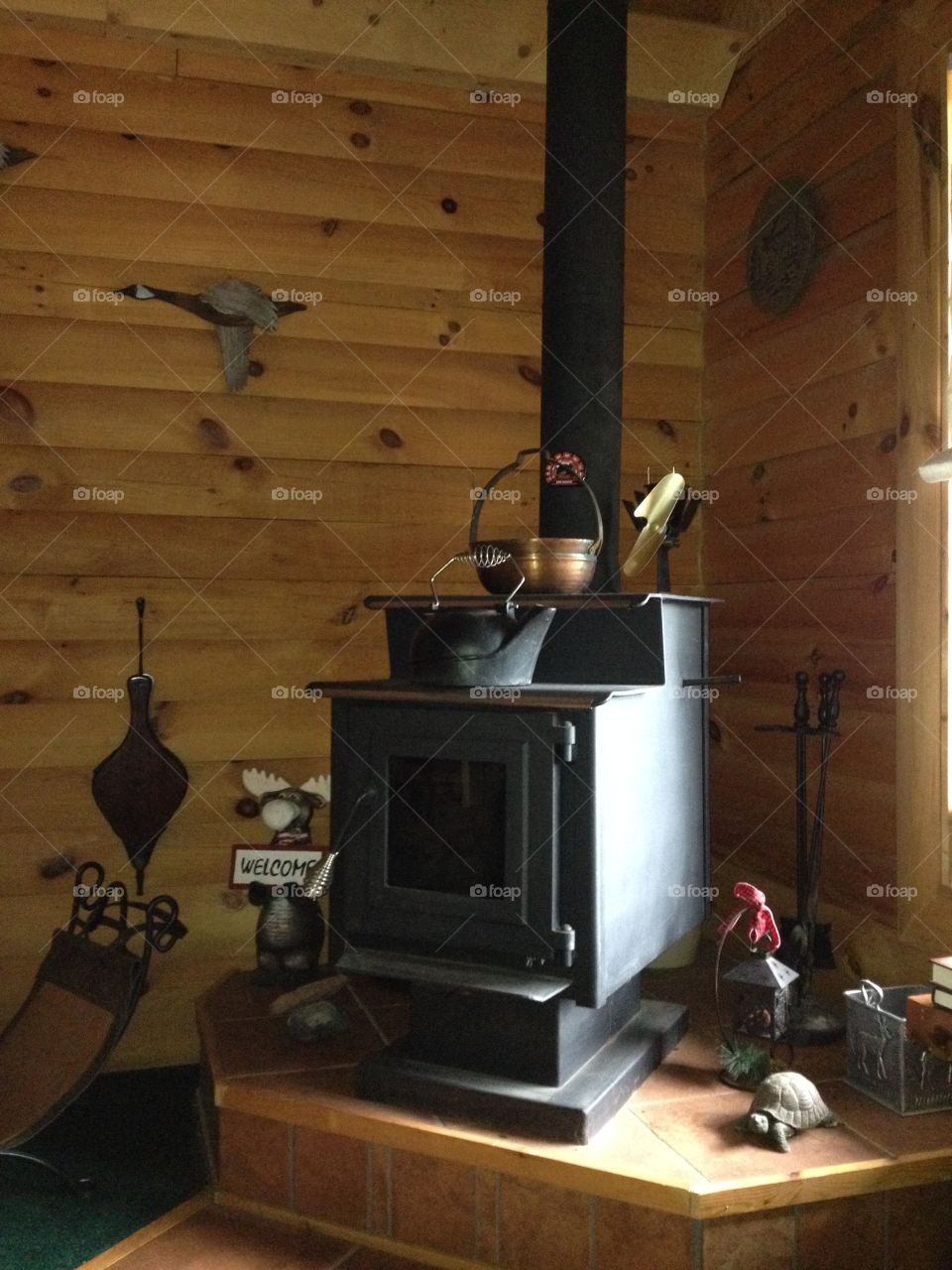 Wood stove heating Log Cabin
