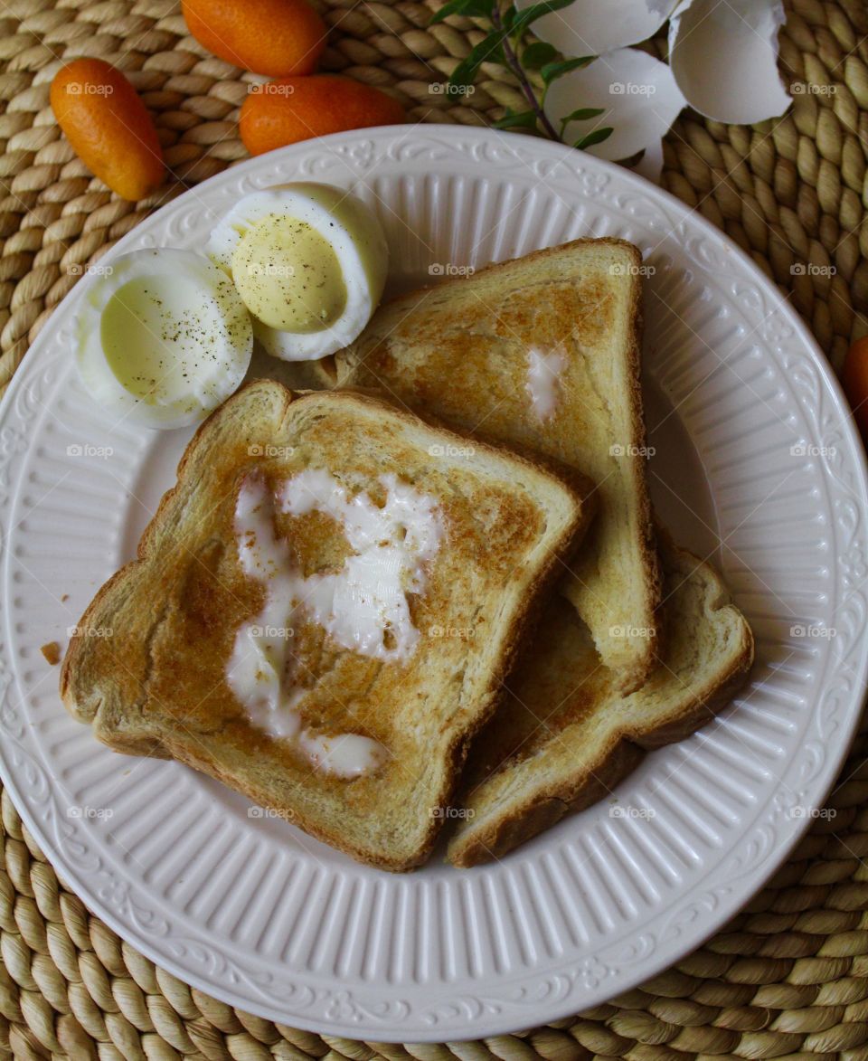 Slices of bread with boiled egg