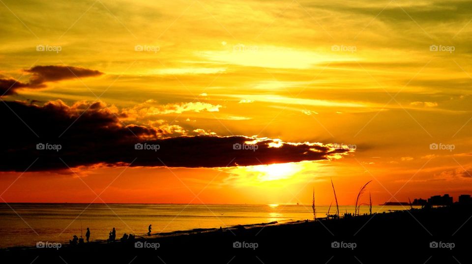 Dramatic sky over the sea at sunset