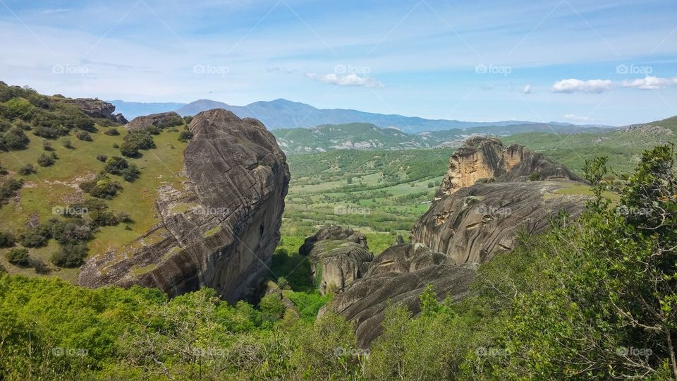 View of a grassy land against sky