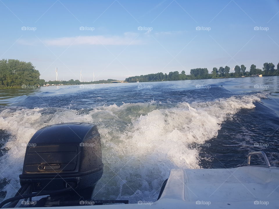 Speedboat Shakespeare with a Yamaha 55 hp outboard motor. Recreational boating on the Brielse lake. The Netherlands