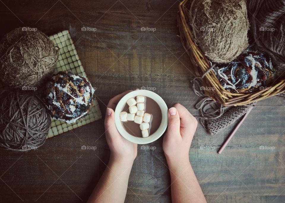 Taking a break from crocheting to drink some hot chocolate.