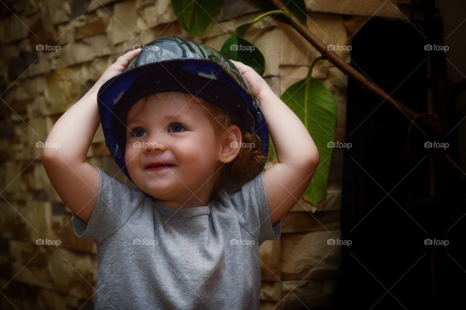 Child in a unique helmet