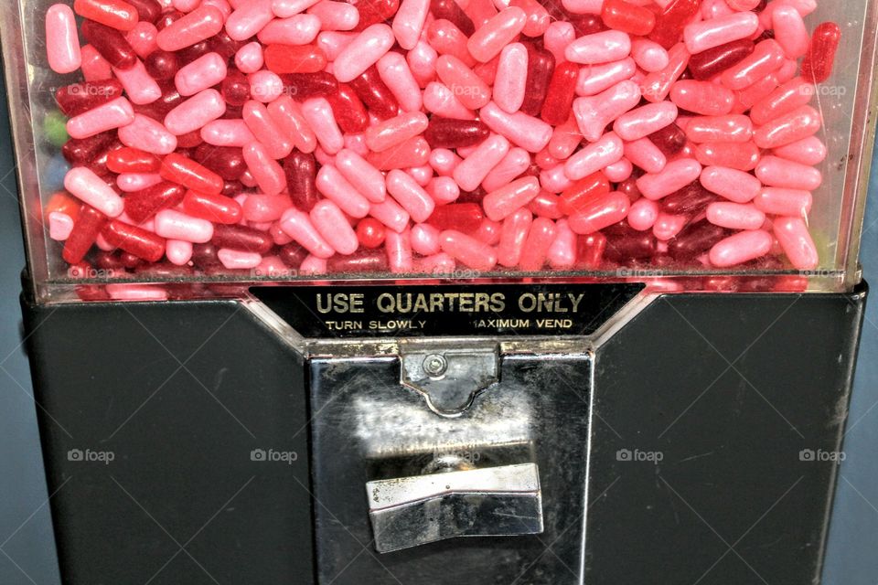 candy machine with pink candies