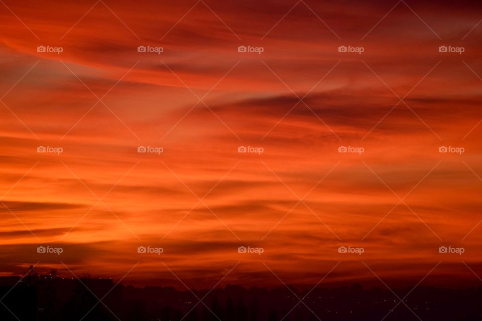 Scenic view of dramatic sky at dusk