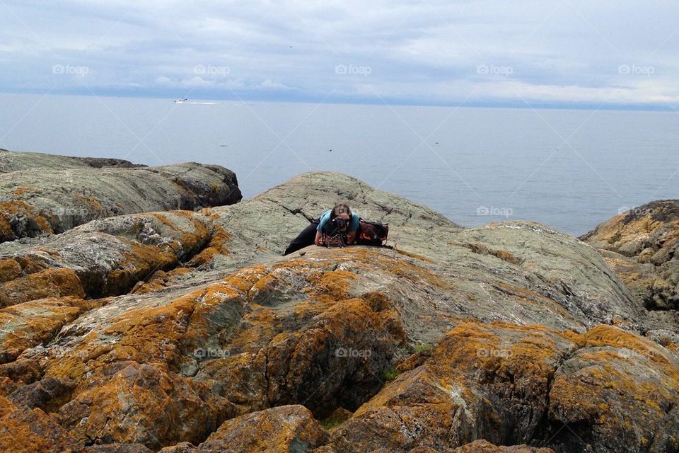Photographer on the rocks