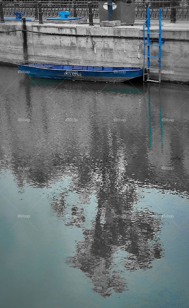 Blue boat on the river