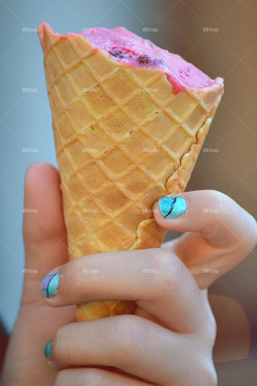 Ice cream. Hand holding ice cream