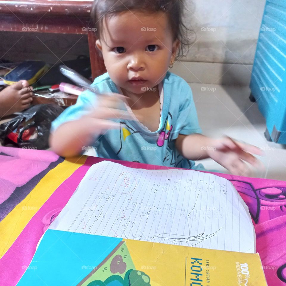 Toddlers learning to write