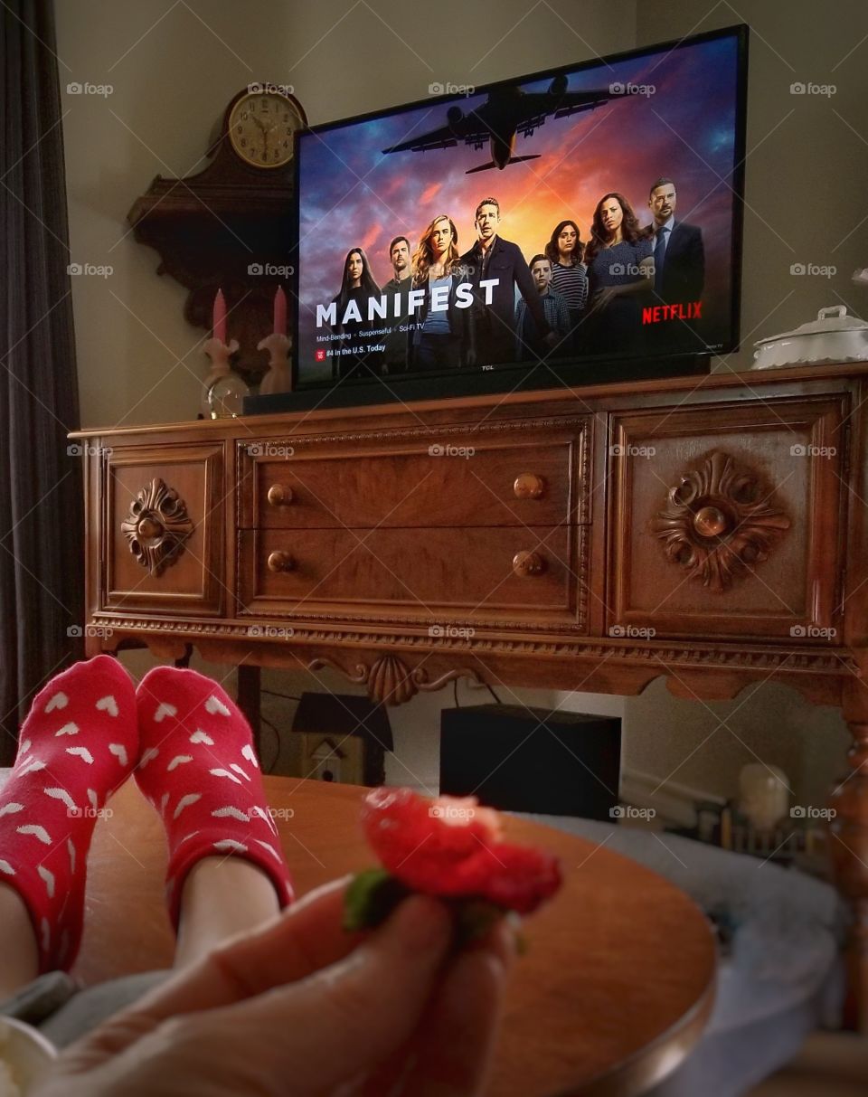 Eating a Strawberry Watching Netflix