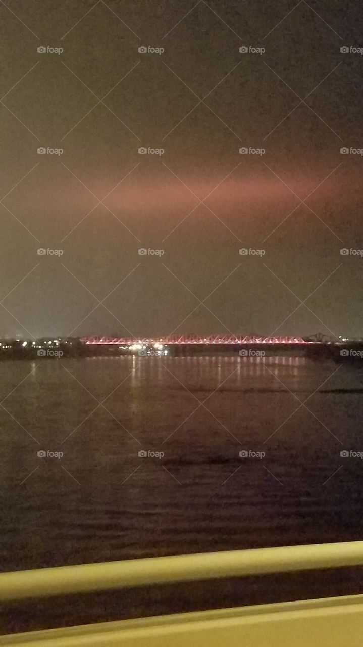 lights reflecting off clouds on Mississippi River in Memphis