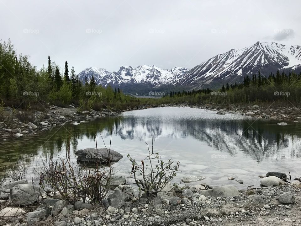 Spring hike into McCarthy Alaska reflection of Wrangell- St Elias Mountains