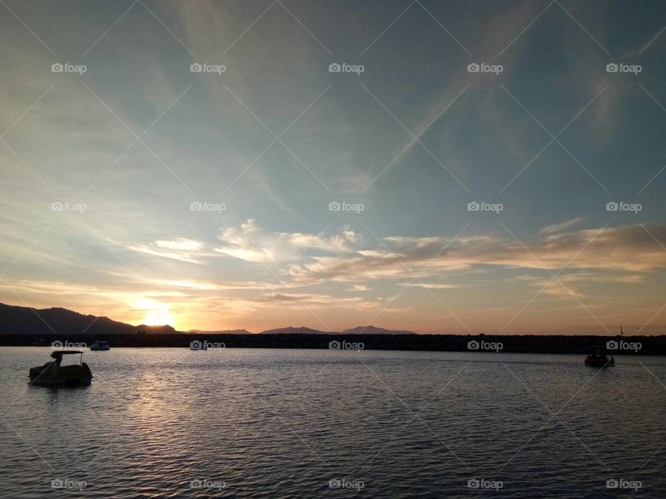 the beautiful view.  sunset in Ulele Beach,  Aceh.