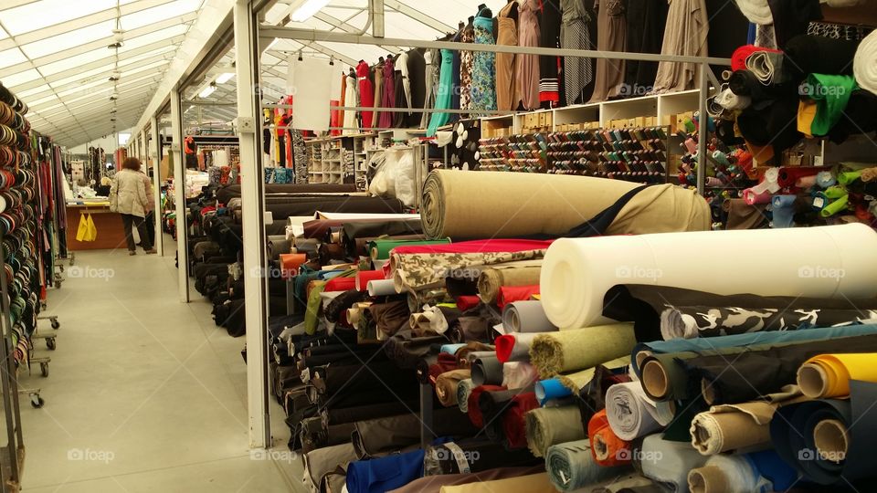 shopping fabric. shopping  fabric on a huge half out Door market