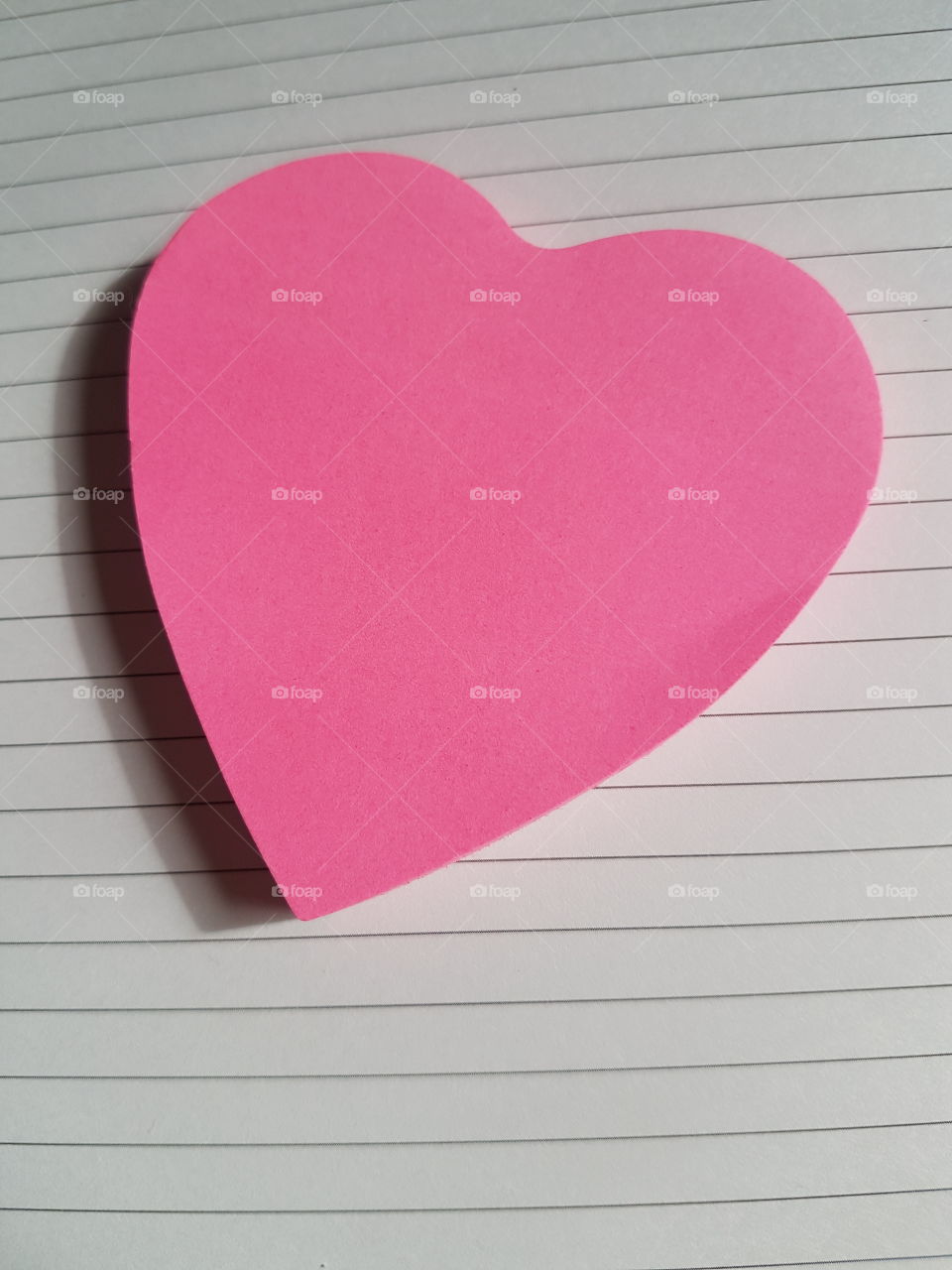 Pink heart shaped post it