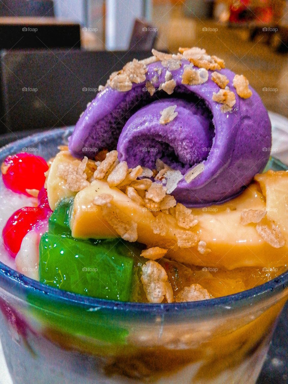 Beating the summer heat with a glass full of halo-halo! Halo-halo is a popular summer refreshment made in the Philippines. Once you visit the country, you should for once try it. 🍧