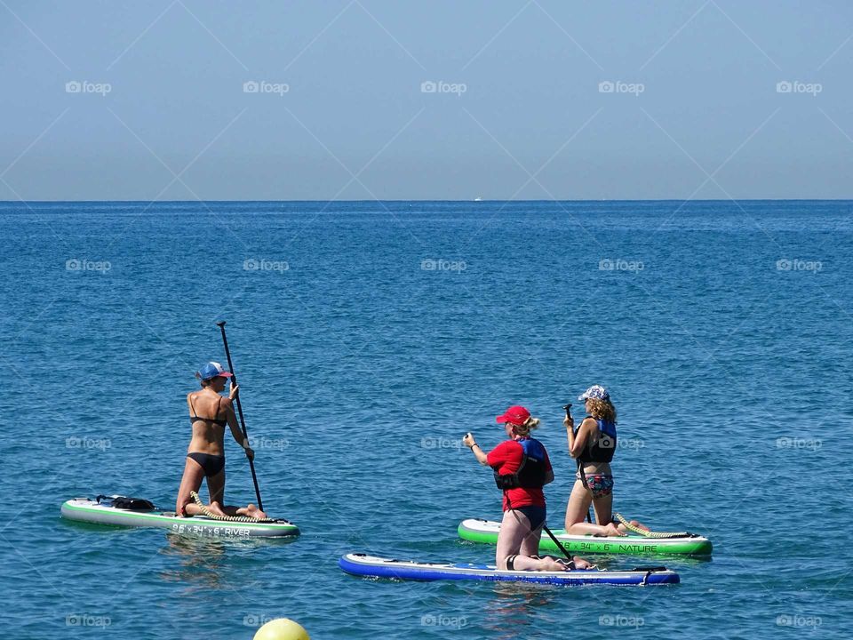 Paddle surf