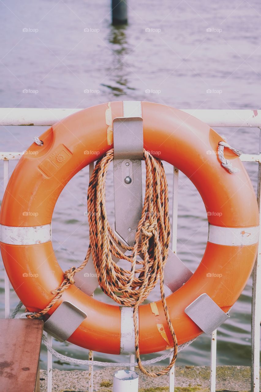 Lifebuoy on the ferry pier. Hamburg Elbe