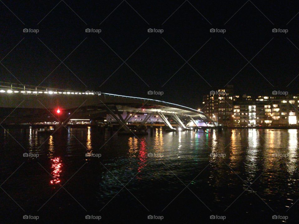 Amsterdam skyline . Bridge connection Amsterdam centre with Amsterdam North