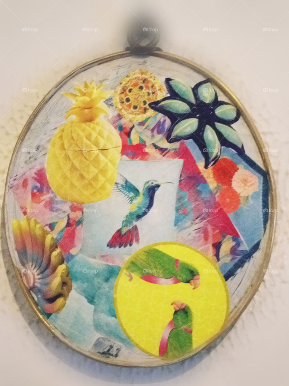 collage with parrots and pineapples