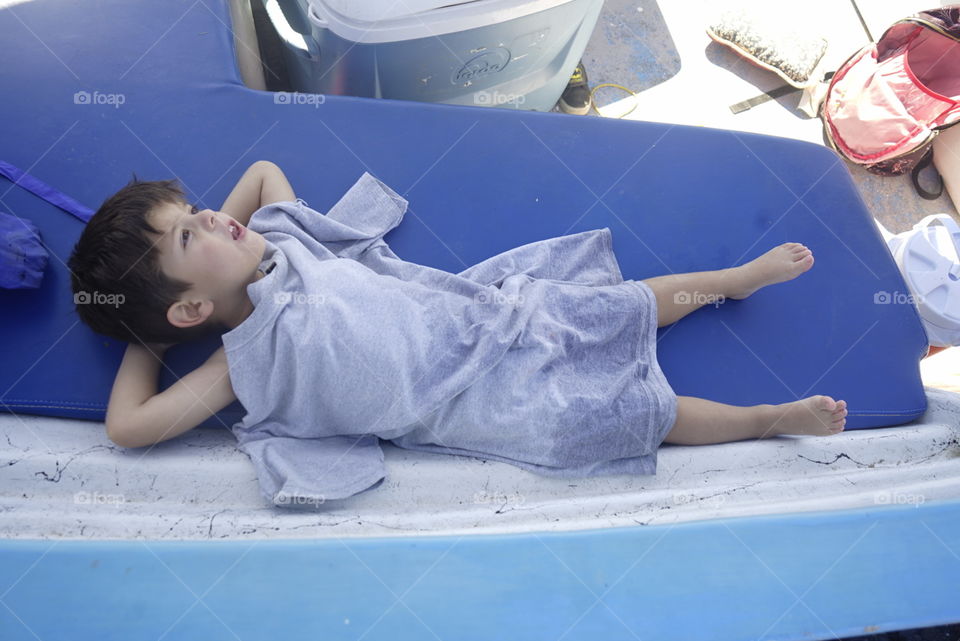 Singing because Life is so relax in a boat. 