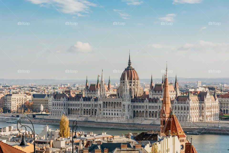 Beautiful cityscape of Budapest with Hungarian parliament building on river bank of Danube