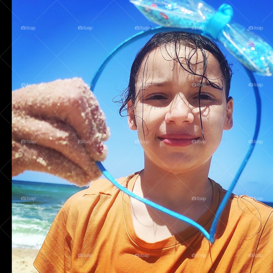 What do you see in this picture of the innocent girl?