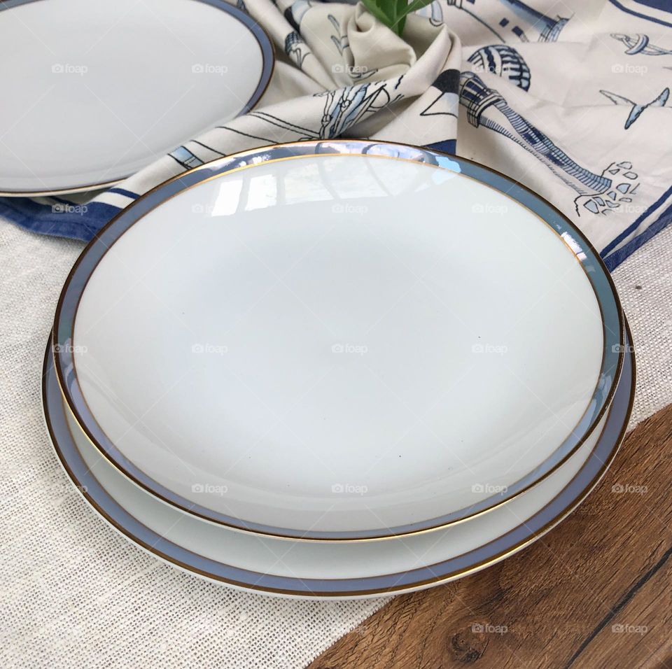 Old Rosenthal porcelain set of white plates with silver platters 